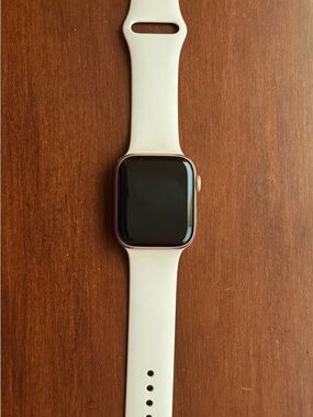 Apple Watch with Pink Sport Band.